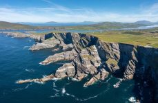 aerial panorama landscape view of the Kerry Cliffs and Iveragh Peninsula in County Kerry of Ireland